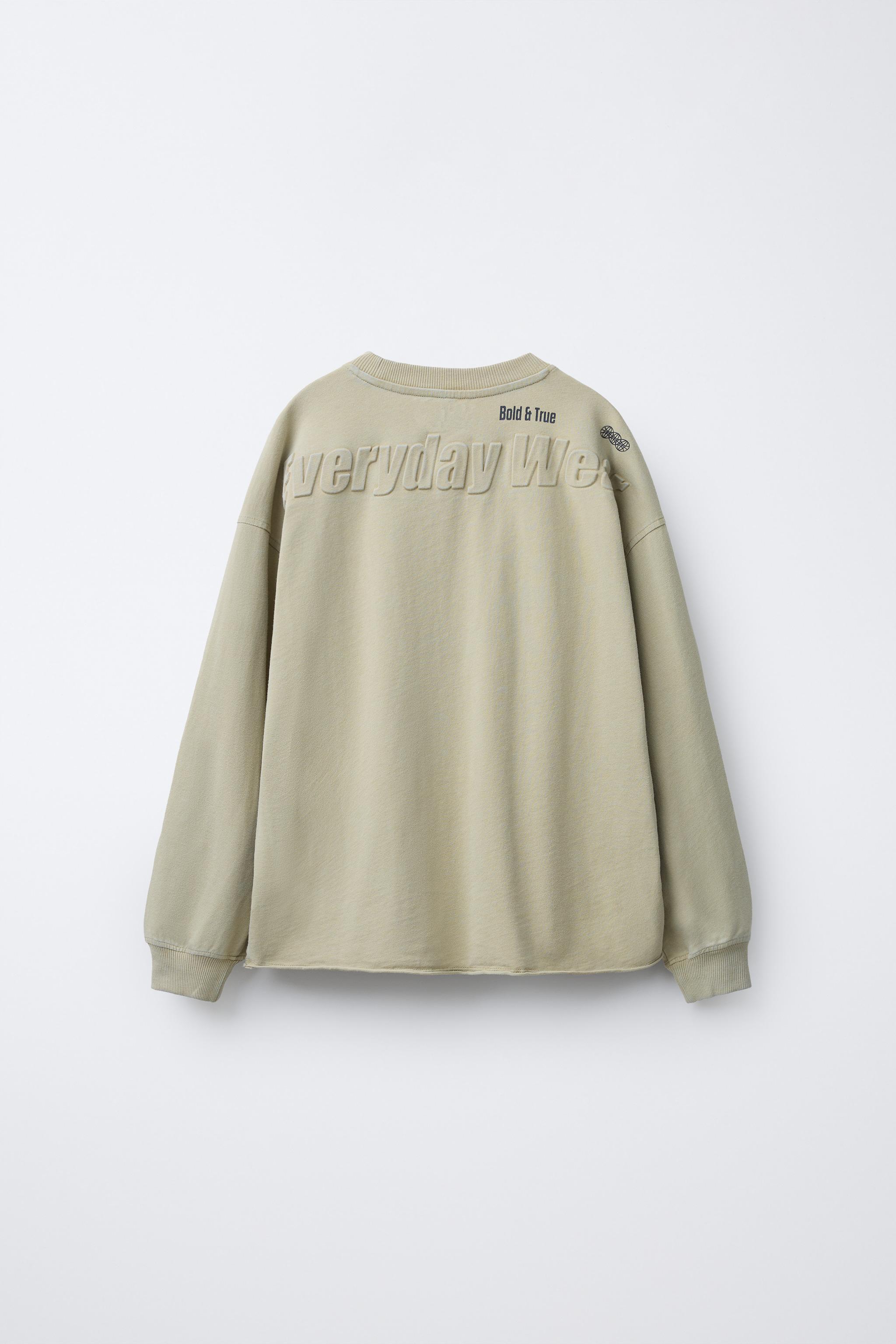 T-SHIRT EFFET DÉLAVÉ INSCRIPTION EN RELIEF